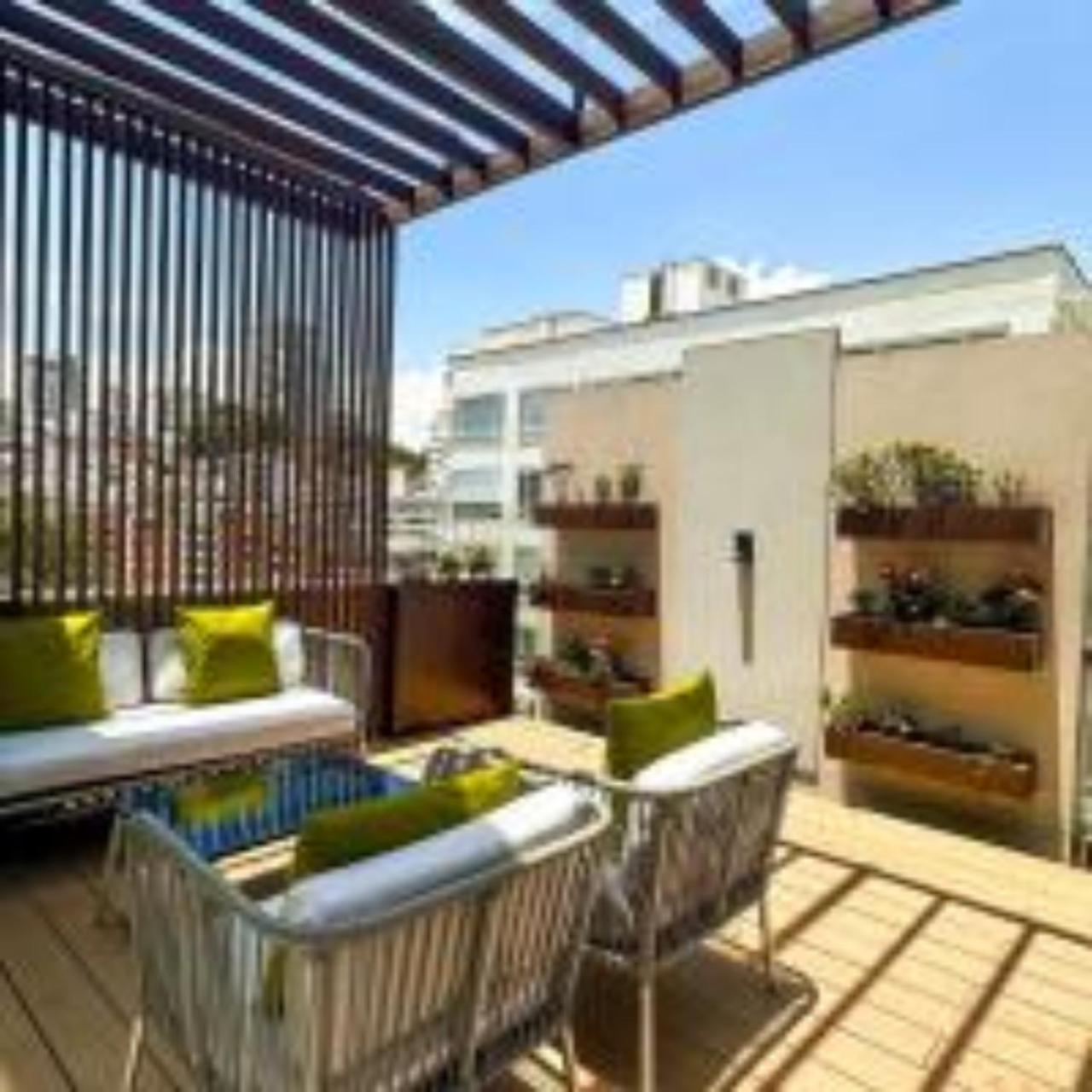 Quo Quality Hotel Манисалес Екстериор снимка A rooftop garden